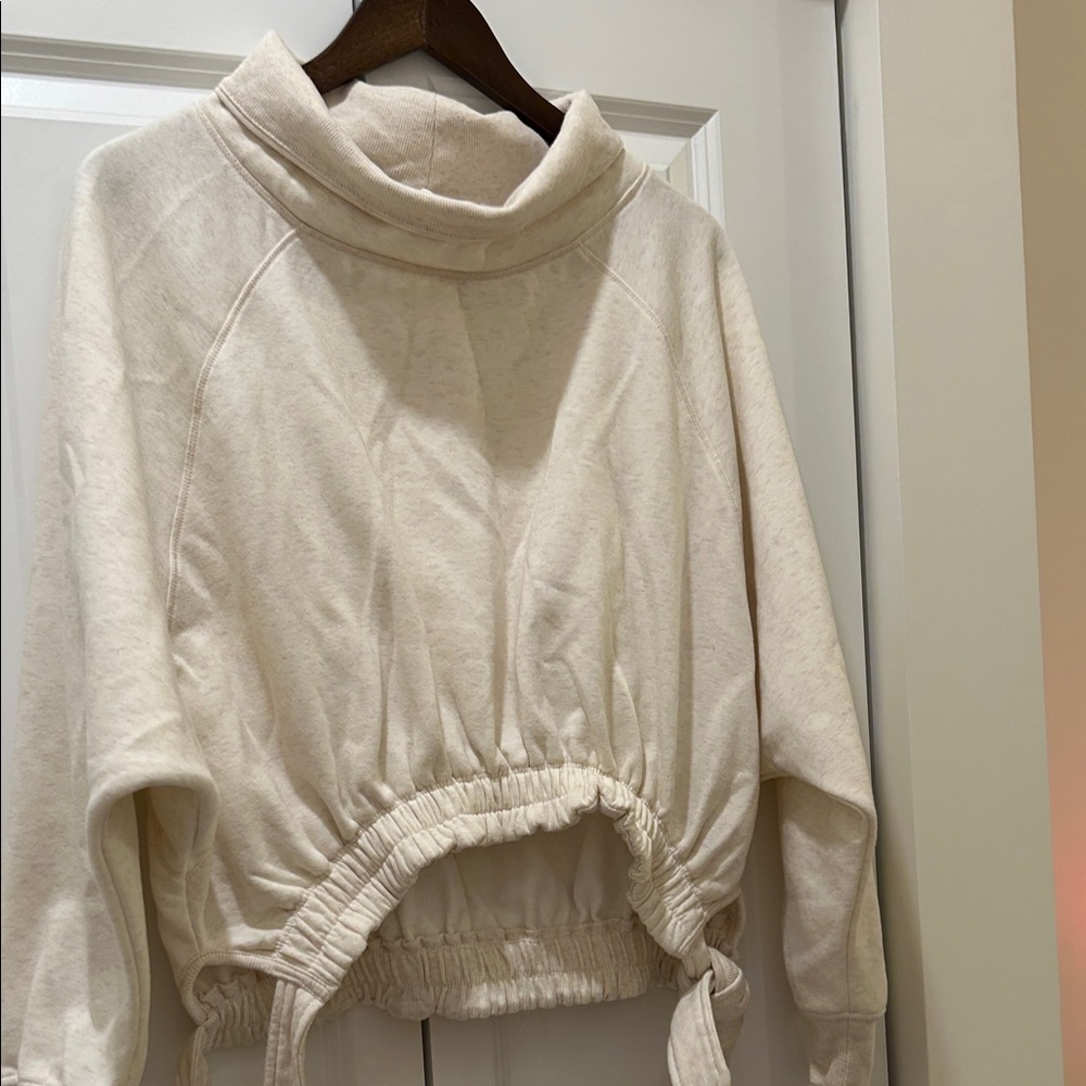 Cream Turtleneck Drawstring Hem top